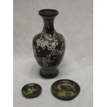 A Japanese cloisonne enamelled baluster-shaped vase with floral decoration on black ground,