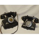 Two various vintage black telephones