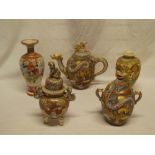 A selection of various Japanese Satsuma pottery including serpent decorated teapot with painted