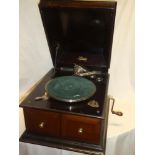 An old Selecta table top gramophone with chromium-plated mounts in stained case with opening doors