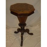 A Victorian inlaid walnut octagonal work box, the hinged lid inset with a chess-board top,