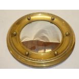 A convex circular wall mirror in brass frame 15" diameter