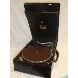 An HMV portable gramophone with nickel-plated mounts in fibre case
