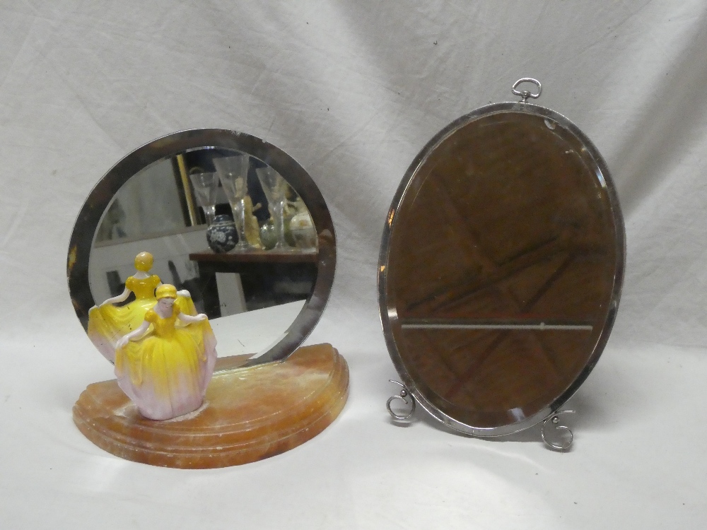 An Art Deco bevelled circular mantel mirror on marble semi-circular base supported by a china