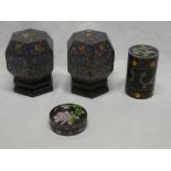 A pair of Eastern cloisonne enamelled hexagonal jars and covers with floral decoration on blue