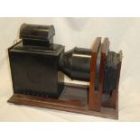 An old mahogany and painted metal magic lantern slide projector (minus lens)