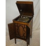 A 1930's/1940's cabinet gramophone by Columbia with nickel-plated mounts in oak case