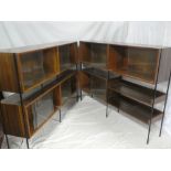 A pair of 1960's teak and painted metal bookcases,