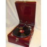 A Selecta portable gramophone with chromium-plated mounts in red fibre case
