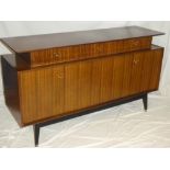 A 1960's G-Plan teak and ebonised sideboard by E.
