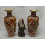 A pair of Japanese Satsuma pottery tapered vases with painted figure decoration,