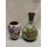 A Dutch Gouda pottery tapered vase with painted floral decoration marked "Poppy Arnhem" and one