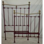 A Victorian-style painted iron and brass single bed