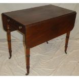 A 19th century mahogany rectangular Pembroke table with a drawer in one end on turned tapered legs