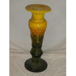 A Bretby pottery yellow and green glazed jardiniere stand on circular base 32" high