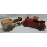 A Tri-ang wooden "Puff Puff" pull-along train and a Tri-ang painted wooden child's cart (2)