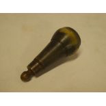 A late 18th/early 19th century cow horn pistol powder flask with tapered body and stopper