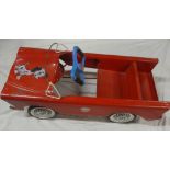 A 1960's child's tin-plate pedal car