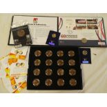 A case containing 16 mint commemorative £2 coins,