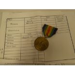 A First War victory medal awarded to No. 34972 Pte. R. E. W.
