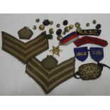 A selection of various military cloth badges, XXLL Divisional badge, military buttons etc.