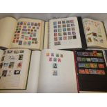 Six albums of mixed World stamps