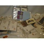 Various World stamps in packets, GB first day covers, postal covers etc.