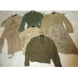 Various military shirts and jackets including 1955 battle dress blouse,