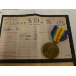 A First War victory medal awarded to No. 2588 Pte. J. W. Williams 1/5 DCLI - died 19.08.