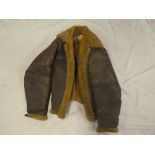 A post-war RAF Irvin leather flying jacket with sheepskin lining,