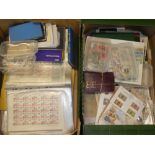 Two boxes containing a large selection of various stamps in packets, albums of World stamps,
