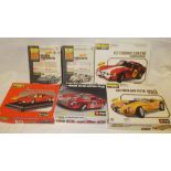 Six Burago diecast boxed car kits including Ferrari 250 GTO, Ferrari Testarossa, Porsche 911 etc.