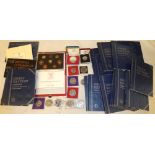Two GB Deluxe Year Sets for 1986 and 1987, three various coin year sets,