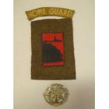 An original Second War Penzance Home Guard printed cotton arm badge with Home Guard title and DCLI