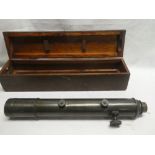 A brass artillery gun sighting telescope,