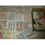 A box containing various albums of mixed World stamps, postal covers, booklets of stamps,
