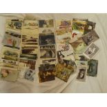 A selection of mixed black and white and coloured postcards - greetings, cats, topographical,