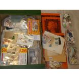 A box containing numerous packets and boxes of mixed World stamps etc.