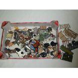 A quantity of Britains and other metal farm animals, fences, gates, figures etc.