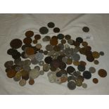 A selection of mixed GB and Foreign coins including some silver examples,