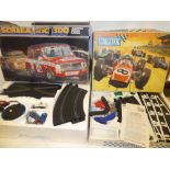 Scalextric 300 model racing game in original box and a Scalextric Sports 31 racing set,