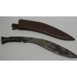 A Ghurka service kukri with 13" single edged blade in leather sheath