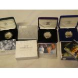 Three cased silver commemorative crowns with certificates including 2006 Queen's 80th Birthday,