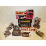 A selection of mint and boxed diecast vehicles including large size Maisto 1:18 Porsche Boxter and