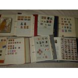 Various albums and folders of mixed World stamps including two folder albums of USA stamps,
