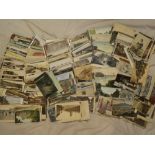 A large selection of mixed black and white and coloured postcards - topographical scenes etc.