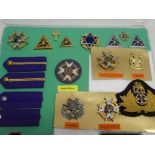 A collection of South African Chaplain's insignia including enamelled Chaplain's badges,