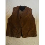 A Second War era Pioneer's leather sleeveless jerkin with black fabric interior