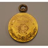 A 1925 9ct gold Professional Football Charity Fund medal won by West Ham United bearing an engraved