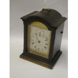 A good quality miniature bracket clock by William Rowlands of London with silvered dial in mahogany